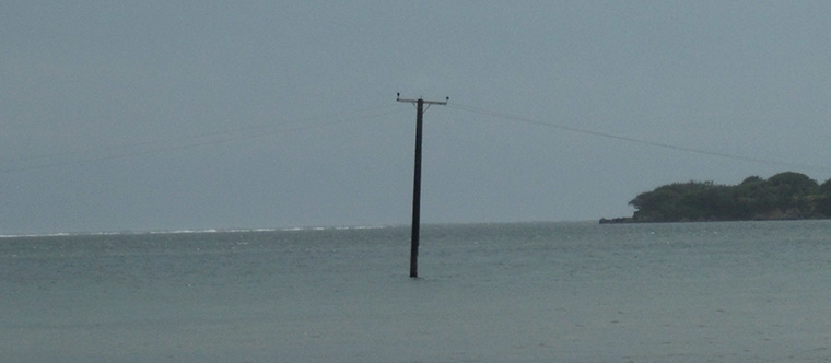 Picture of a power pole in the sea